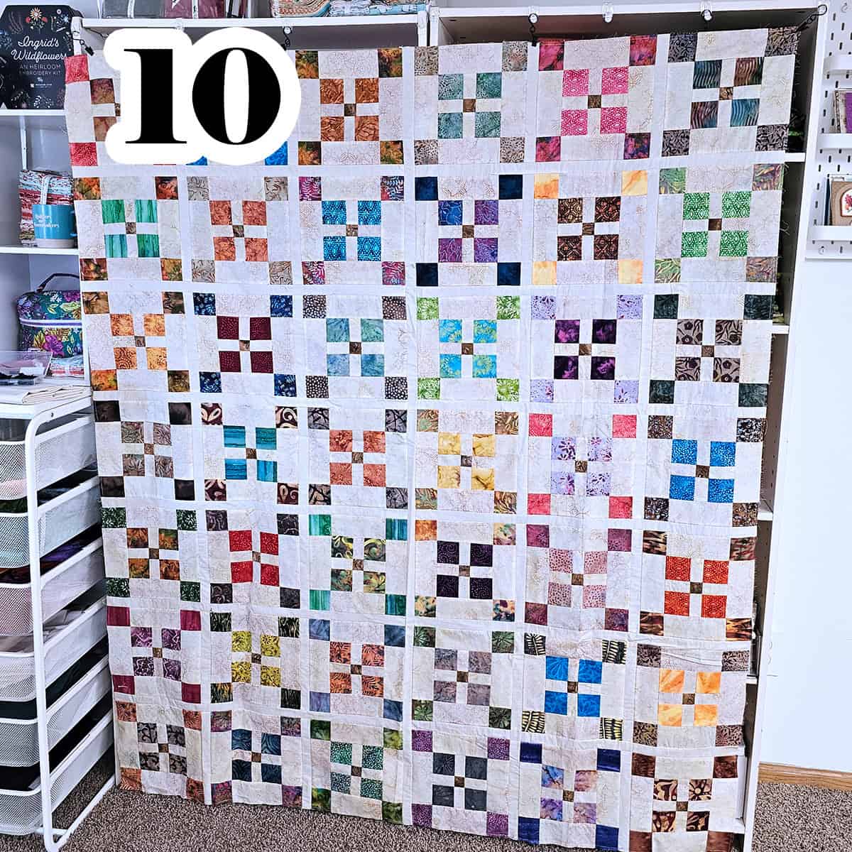 Batik uneven 9 patch quilt top