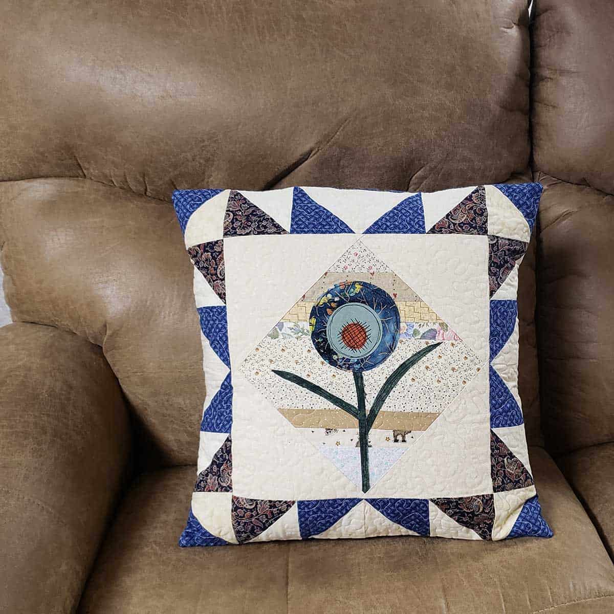 quilted pillow on chair