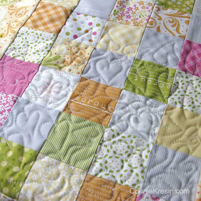 Orange Kissed Tablerunners tutorial fabric piecing the table runners closeup of quilting