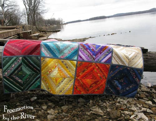 Rainbow Strings quilt by the river at Freemotion by the River