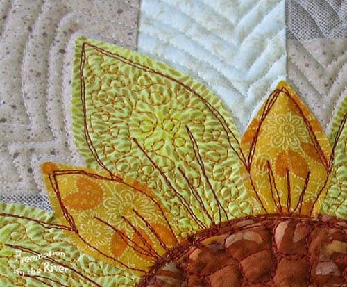 Closeup of quilting on a flower at Freemotion by the River