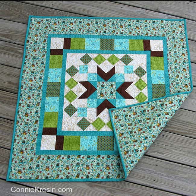 Whos Who quilted wall hanging tutorial peek at backing fabric