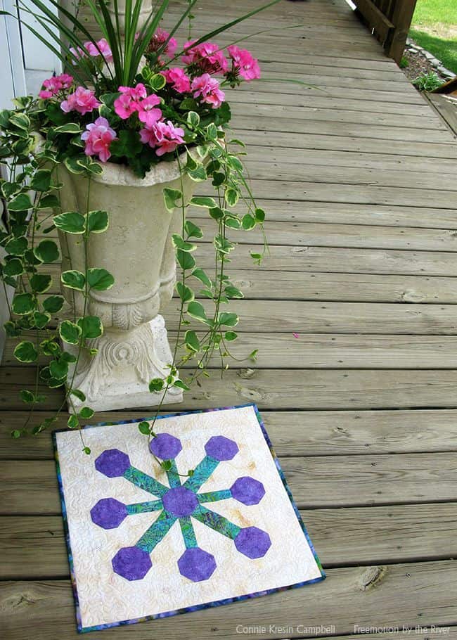 Beautiful batik table topper from the book Holiday Wishes by Sherri Falls