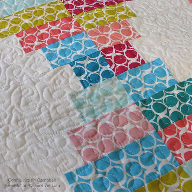 Closeup of the quilting on the Round Elements table runner