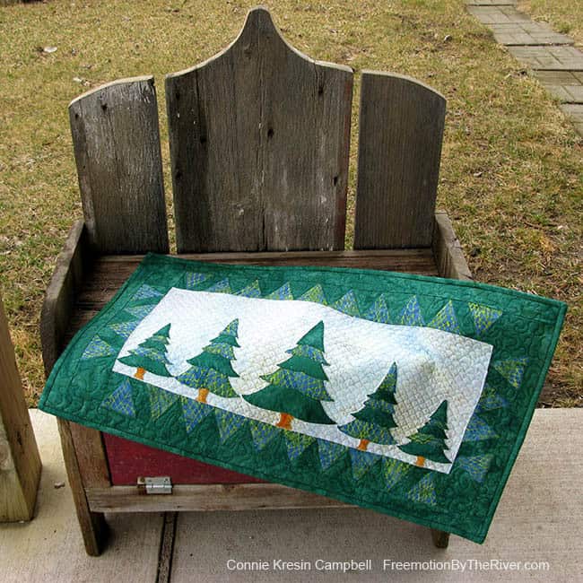 Evergreens wall hanging on a bench great gift