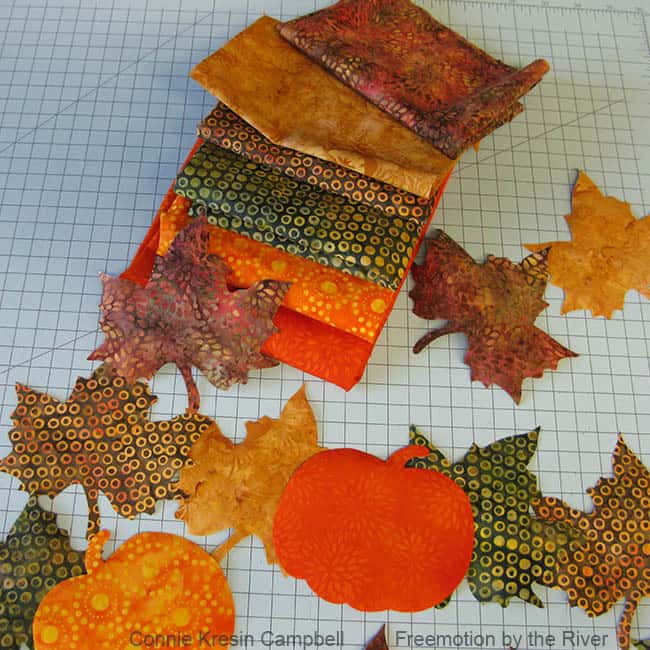 Pumpkins and leaves cut with AccuQuilt die