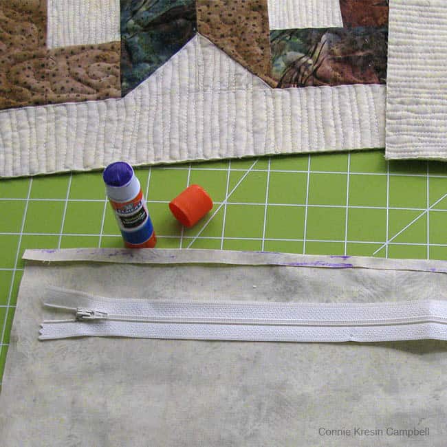 Use a glue stick for the zipper on pillow