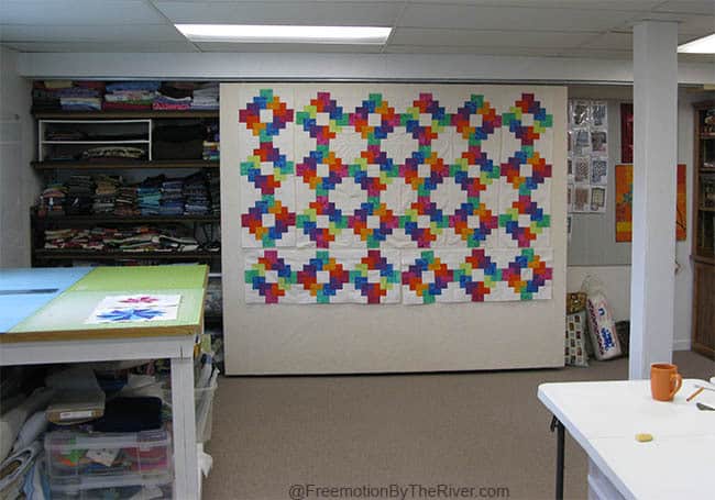 Design wall with quilt on it
