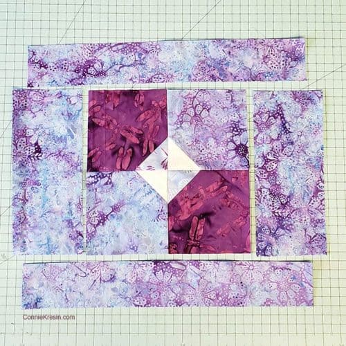 Quilt placemat using the Bow Tied quilt block out of different batiks