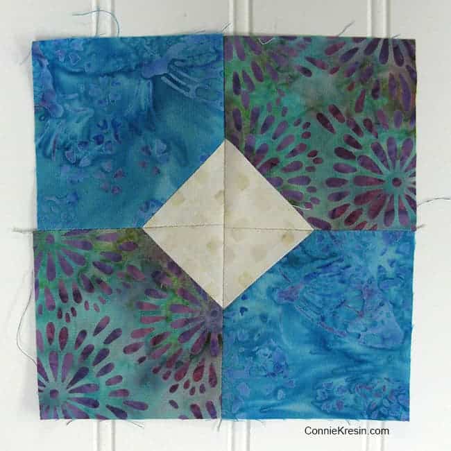 Bow Tied quilt block with four sections sewn together