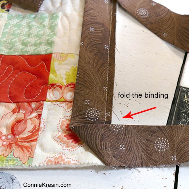 How to add binding to a quilt corner stitching