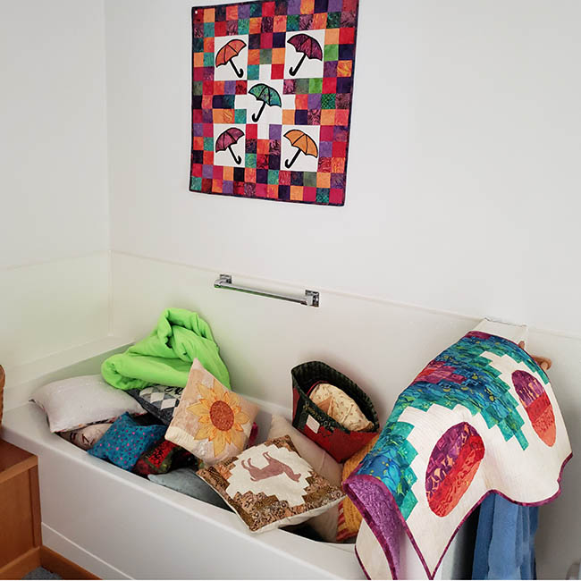 Bathtub full of pillows