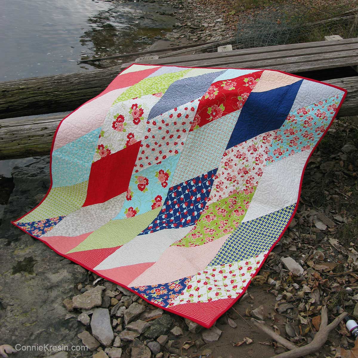Quilt on telephone pole by the river