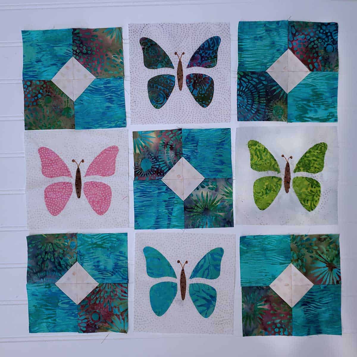 Applique the butterfly blocks