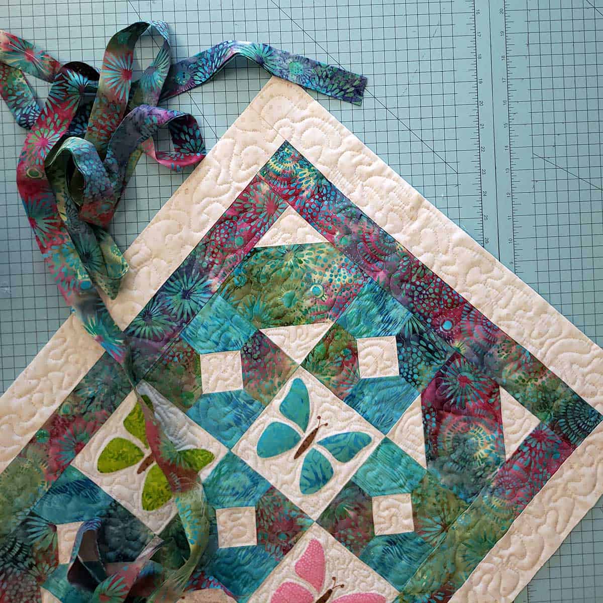 Butterfly cage quilt ready for the binding