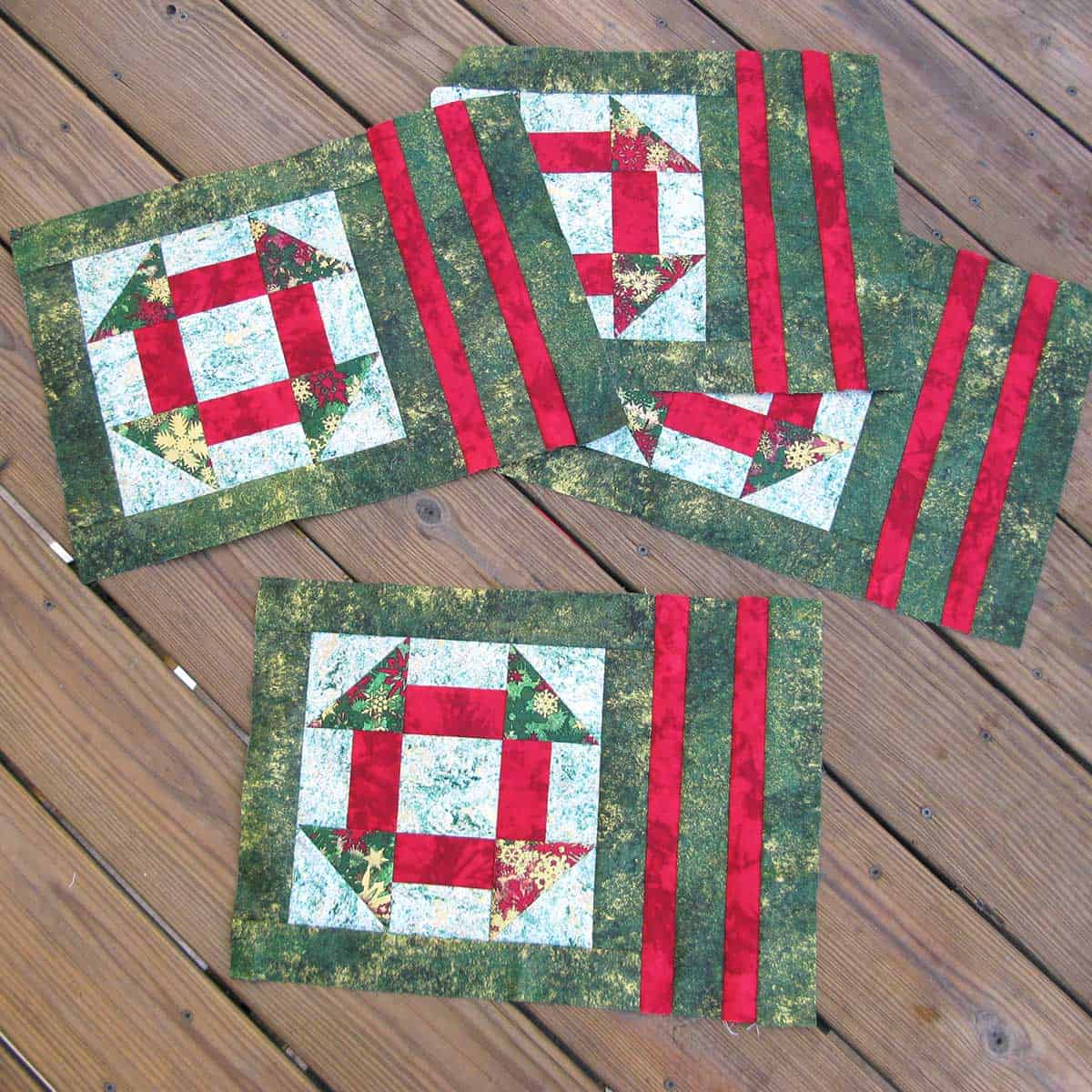 Churn Dash Christmas Placemats all pieced