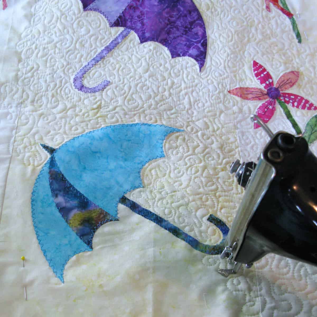 Quilting Dancing Umbrellas on my vintage sewing machine