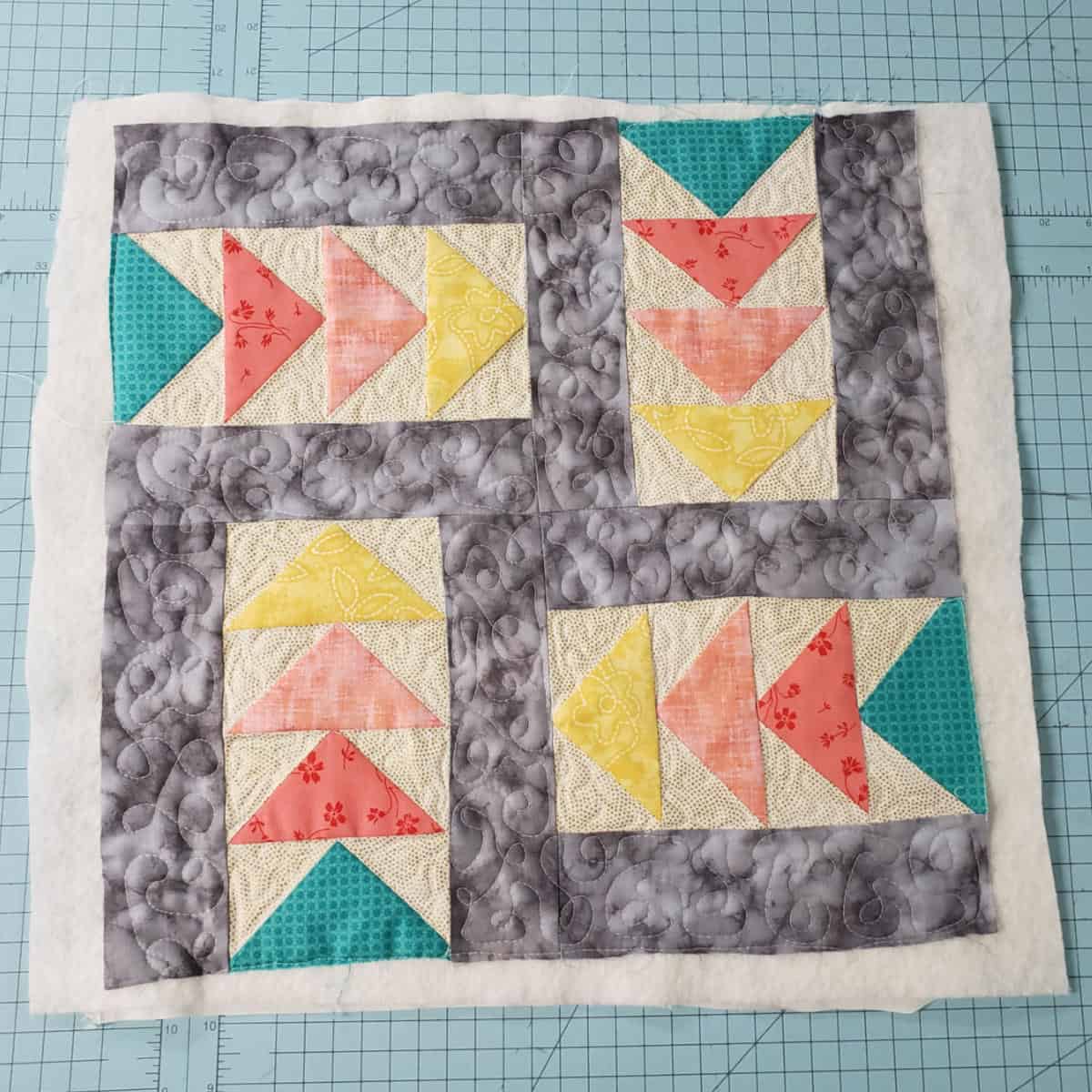 Adding batting and quilting to pillow top