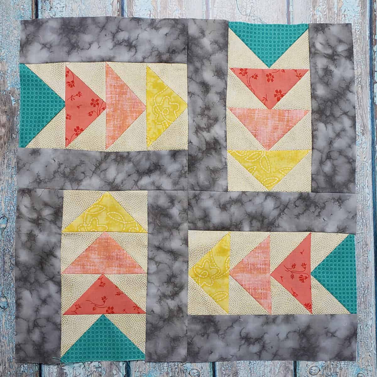 Sewing the flying geese blocks together