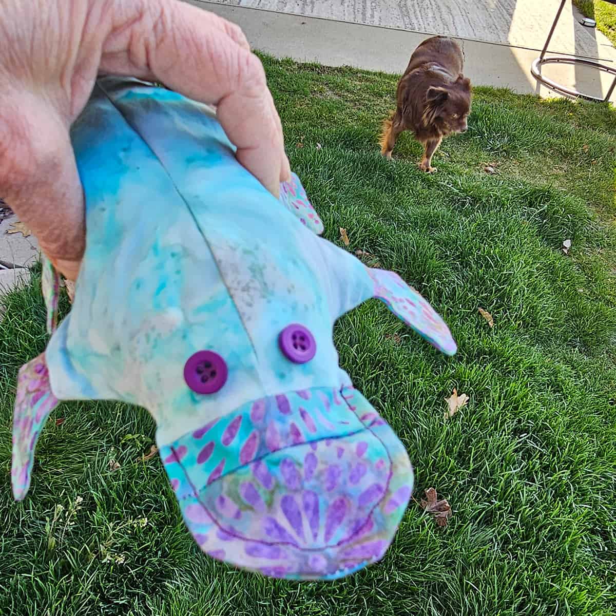 Holding on to the stuffed animal