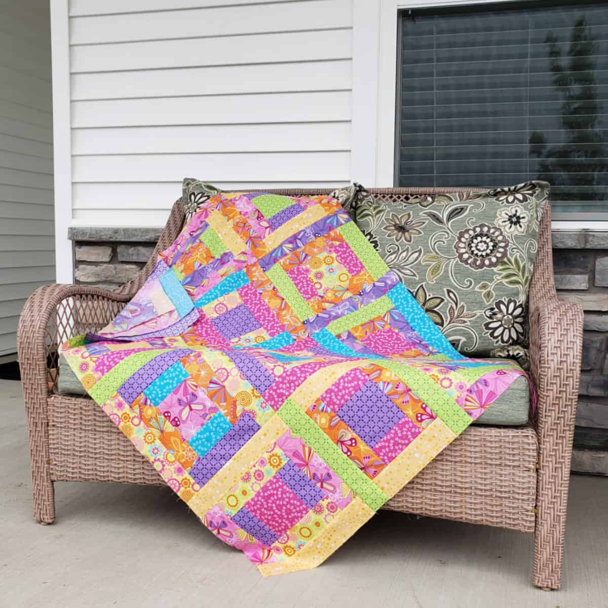 River Squares baby quilt on front porch