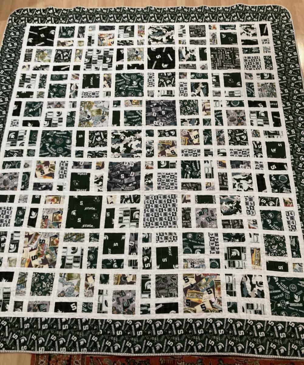 Scattered quilt with Michigan State fabrics