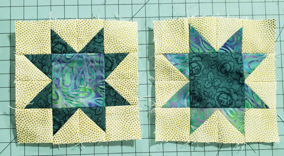 two sawtooth star quilt blocks