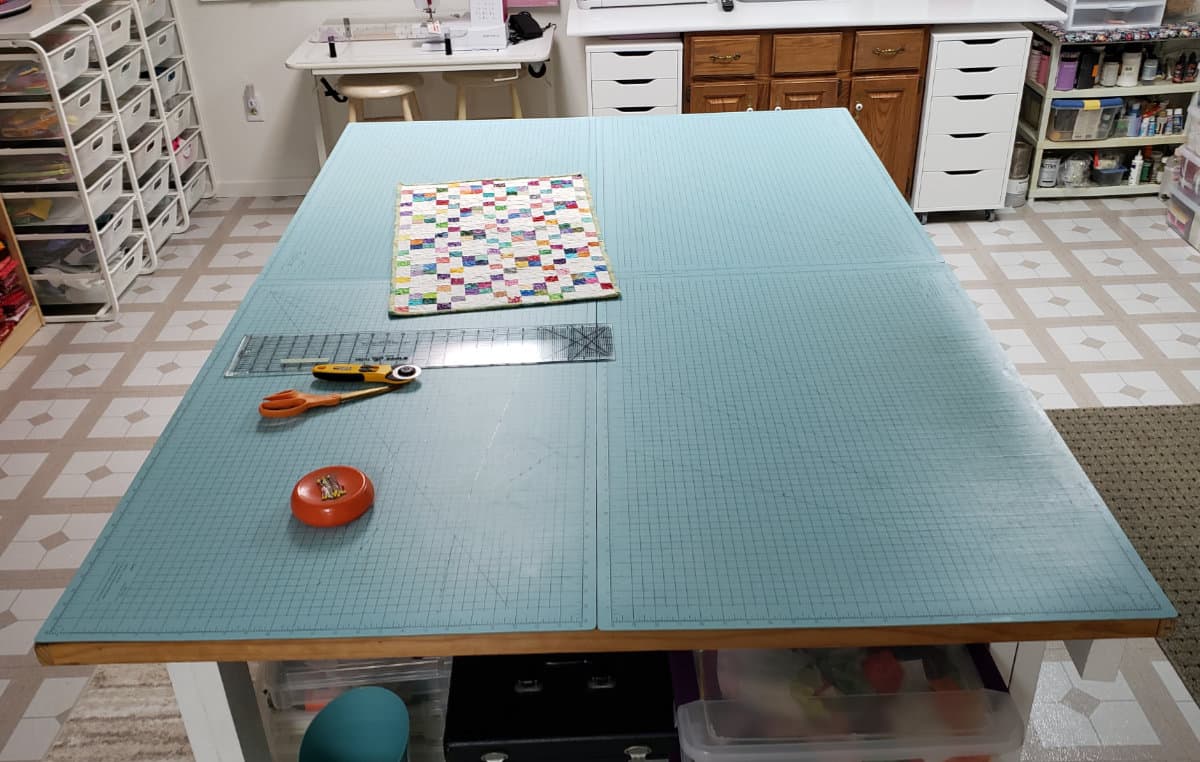 cutting table with mats on it