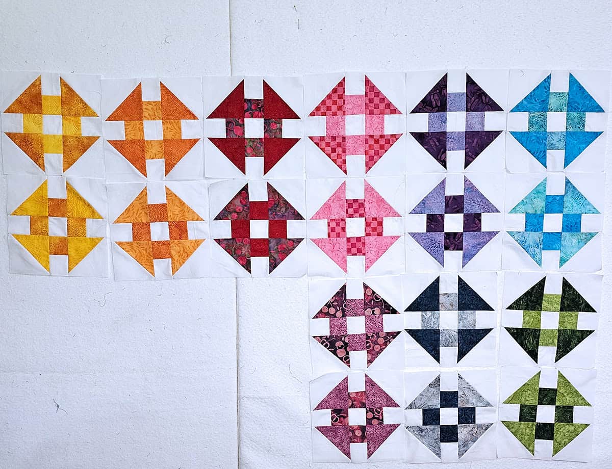 Color Challenge Churn Dash quilt blocks