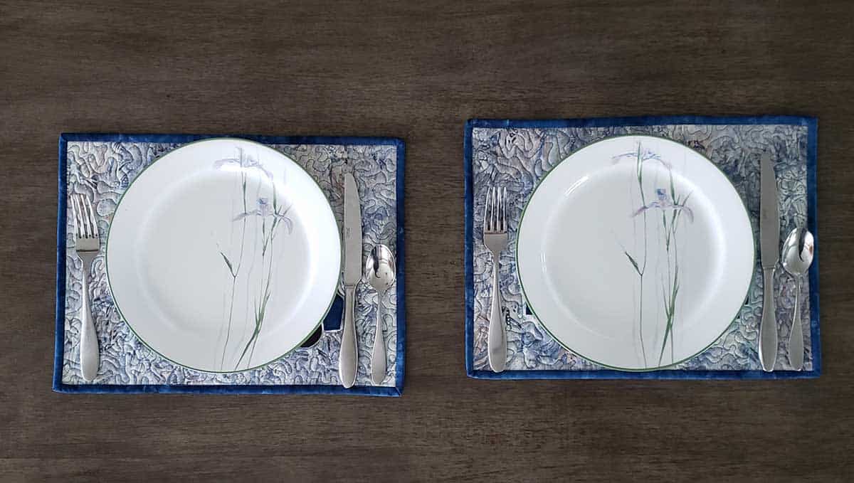 Placemats with dishes on them