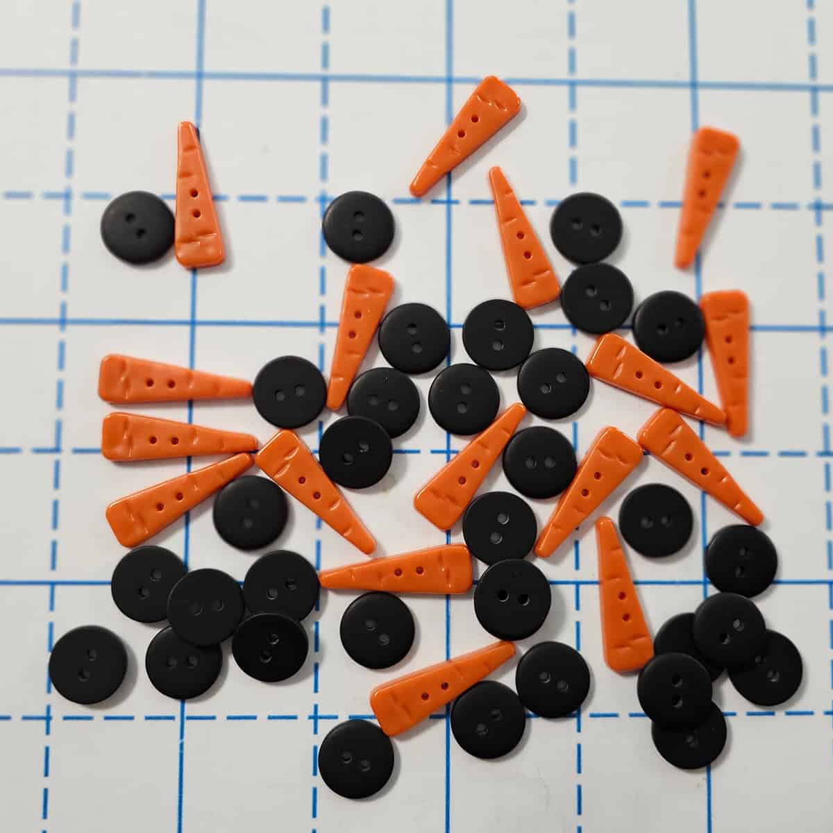 eye and nose buttons for snowmen