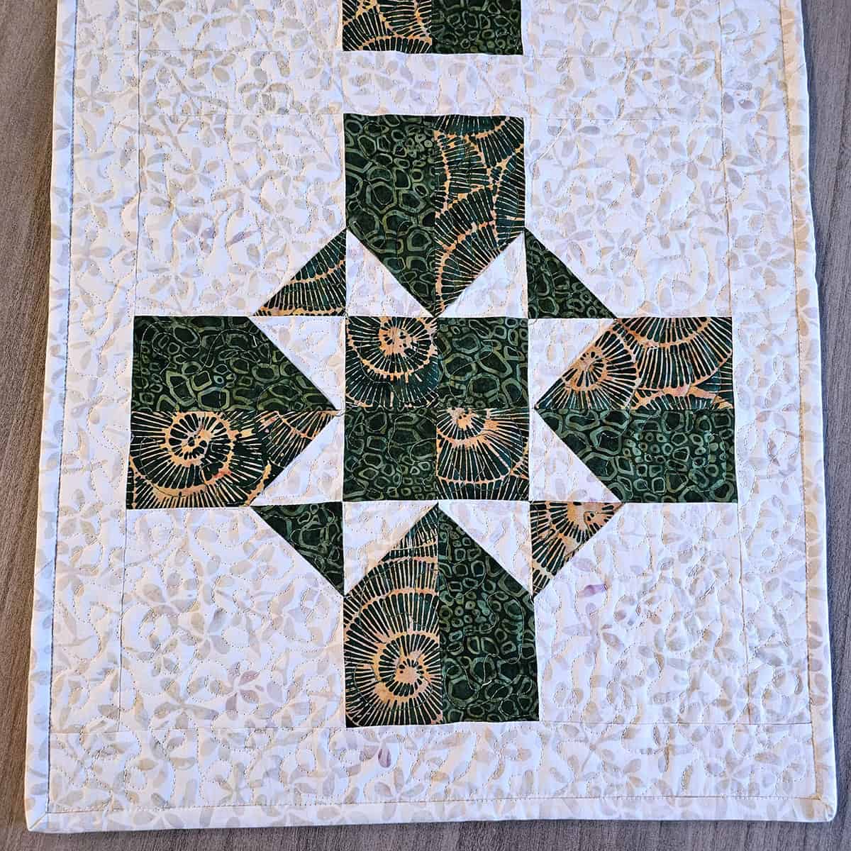 Close up of the Earth Essence table runner