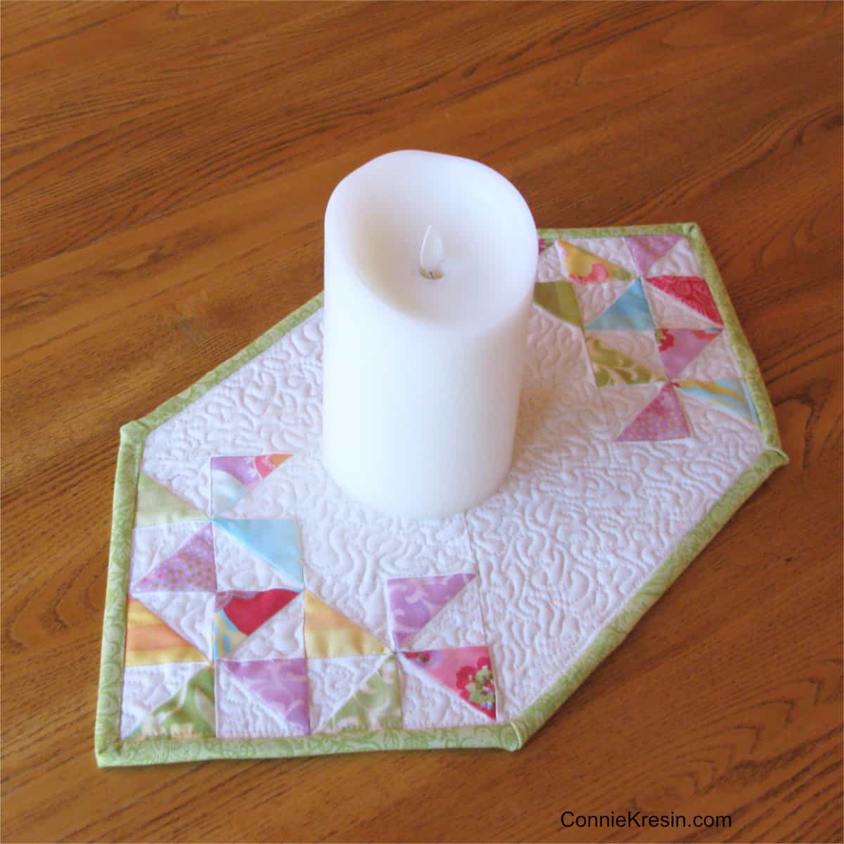 Candle sitting on the mini table topper