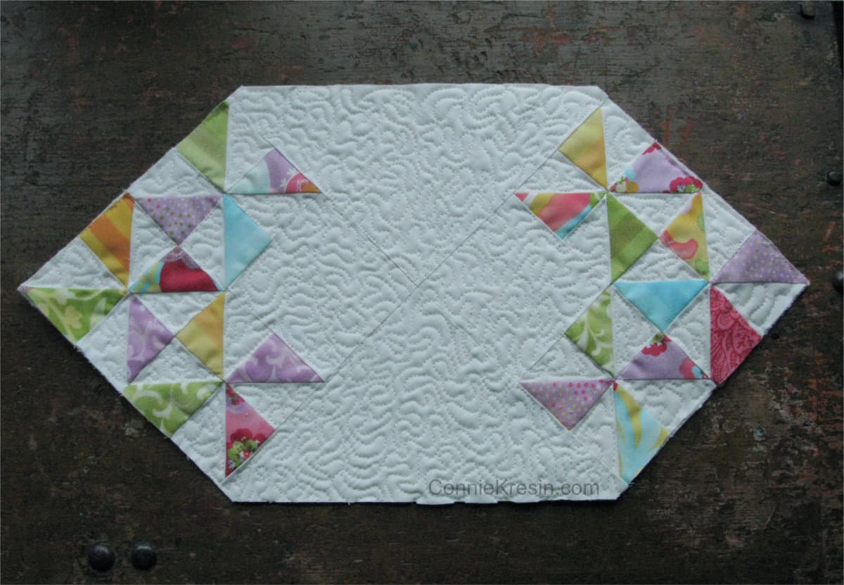 free-motion quilting on the mini table topper