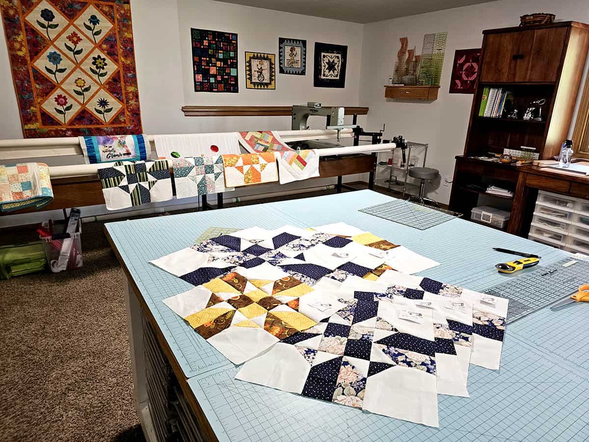 Four Patch Star quilt block samples in my quilt studio