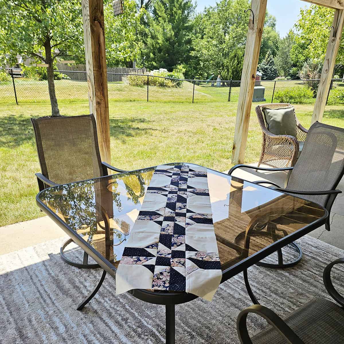 Four Patch Star blocks for a table runner outside