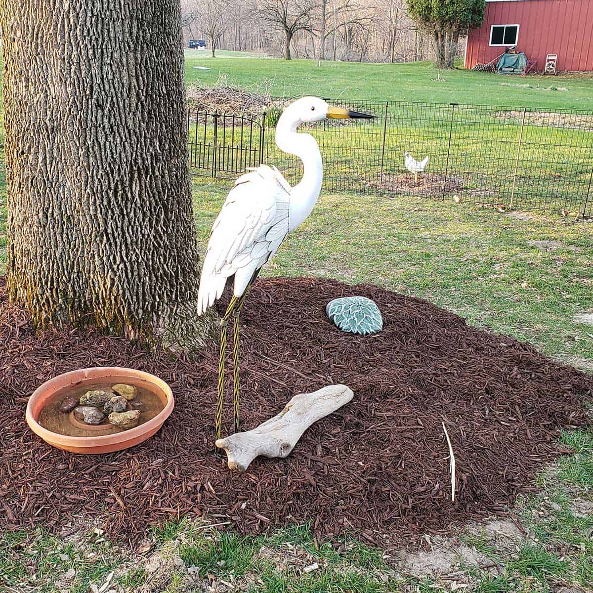 Bird statue in yard
