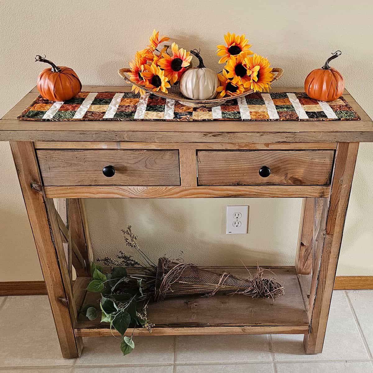 Hall table with runner on it