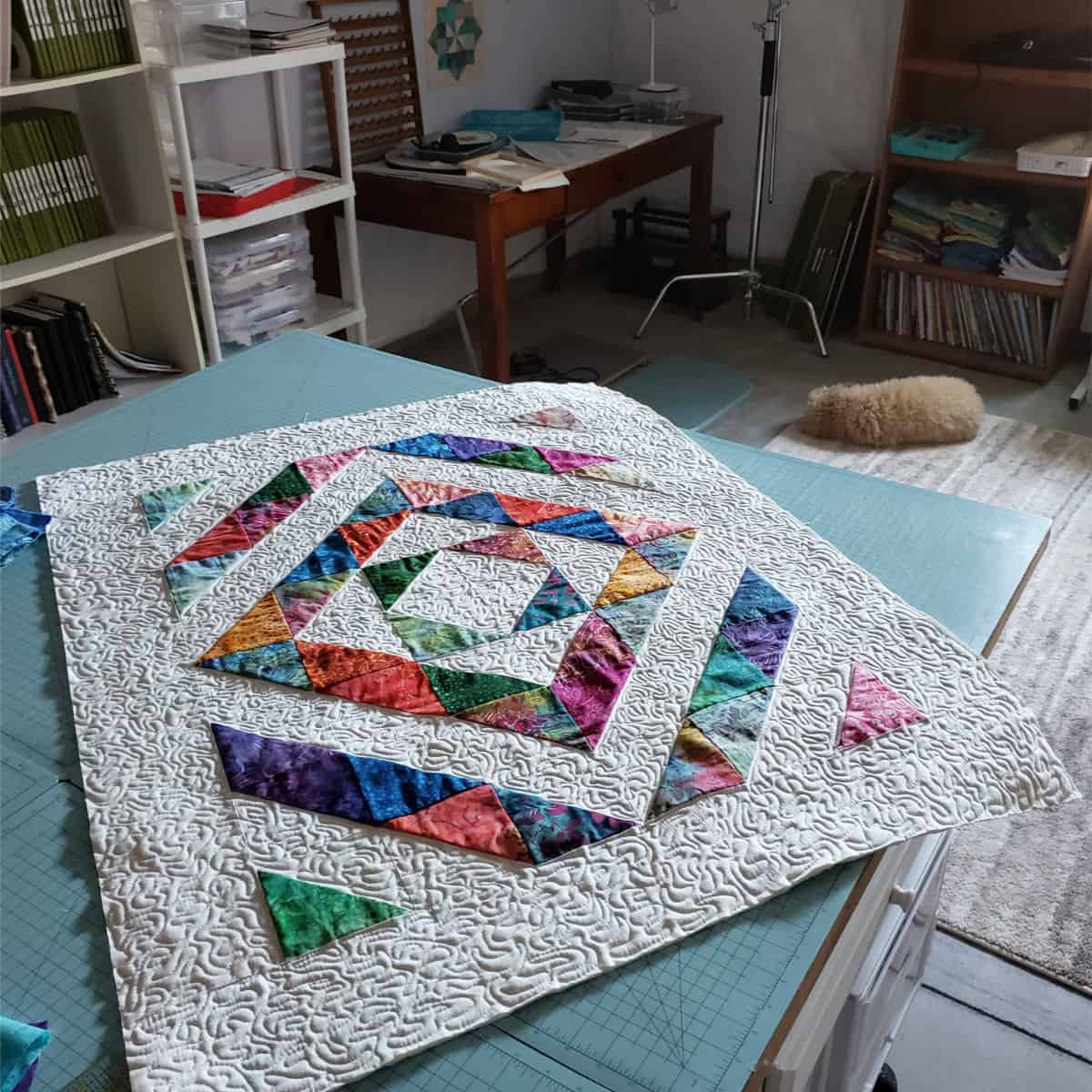 Once the quilting is done, trim the quilt